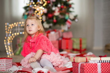 Wall Mural - Little girl  with Christmas