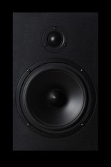 Wall Mural - Black Music speaker on a black isolated background. Party or music listening concept