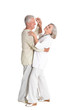 © aletia2011 - Portrait of senior couple dancing on white background