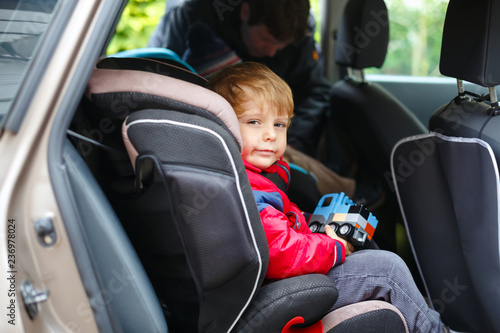 child sitting car