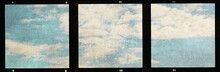 Triple Vintage Film Strip Frame With Blue Sky And Clouds.
