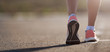 © pavel1964 - Running shoe closeup of woman running on road with sports shoes