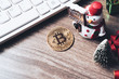 Merry Christmas and Happy new year Bitcoin cryptocurrency still life background concept. Crypto currency bitcoin on a Christmas background.