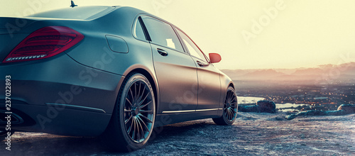 Fotomural Luxury car parked on a mountain.
3D render and illustration.