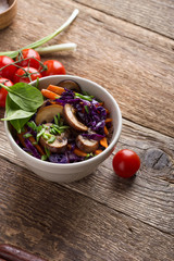 Wall Mural - Stewed vegetables bowl  with cabbage, carrot and mushrooms