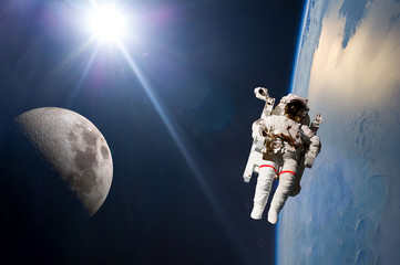 Wall Mural - planet earth and moon orbit with ship and stronaut. elements of this image furnished by nasa f