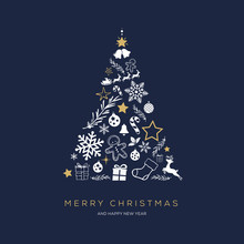 Greeting Card Concept With The Words Merry Christmas. Abstract Christmas Tree Shape Arranged With Festive Symbols