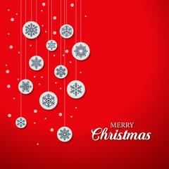 Wall Mural - greeting card with the words merry christmas. from above, stylish snowflake-shaped baubles hang on r