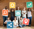 © Rawpixel.com - Diverse happy people with social networking icons