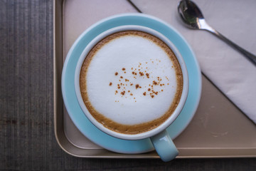 Wall Mural - closeup cappuccino top view, coffee time