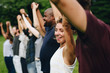 © Rawpixel.com - Happy diverse people holding hands in the park