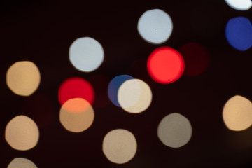 Background of light bokeh from spotlight in night place.