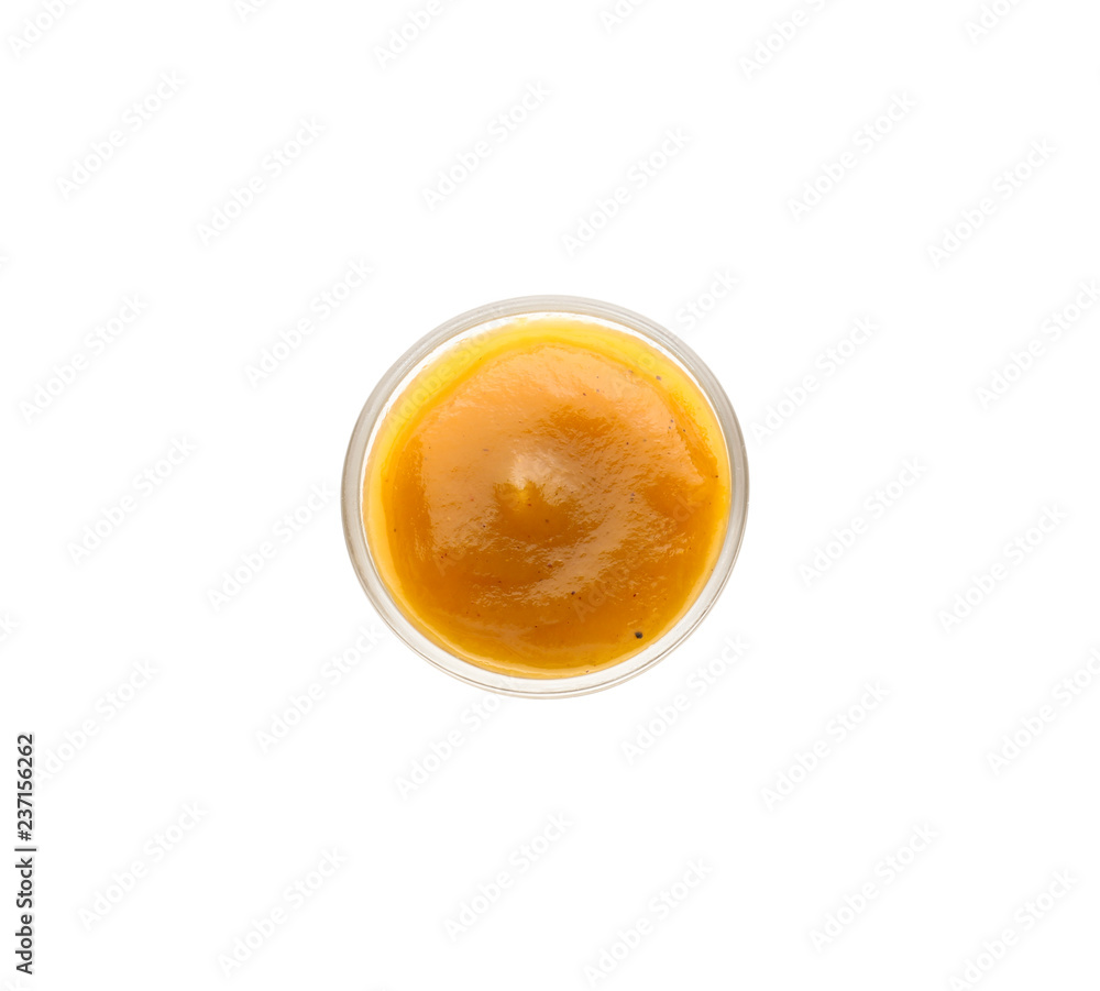 Tasty sauce in bowl on white background