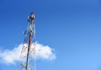 Cellphone telecommunication tower on sky background