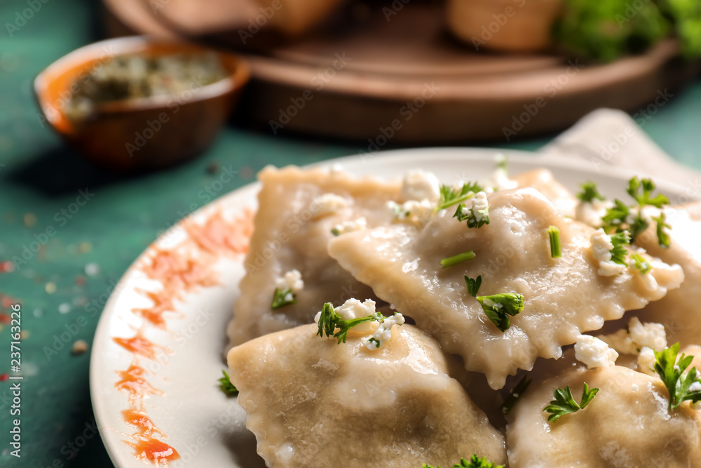 Tasty ravioli on plate, closeup
