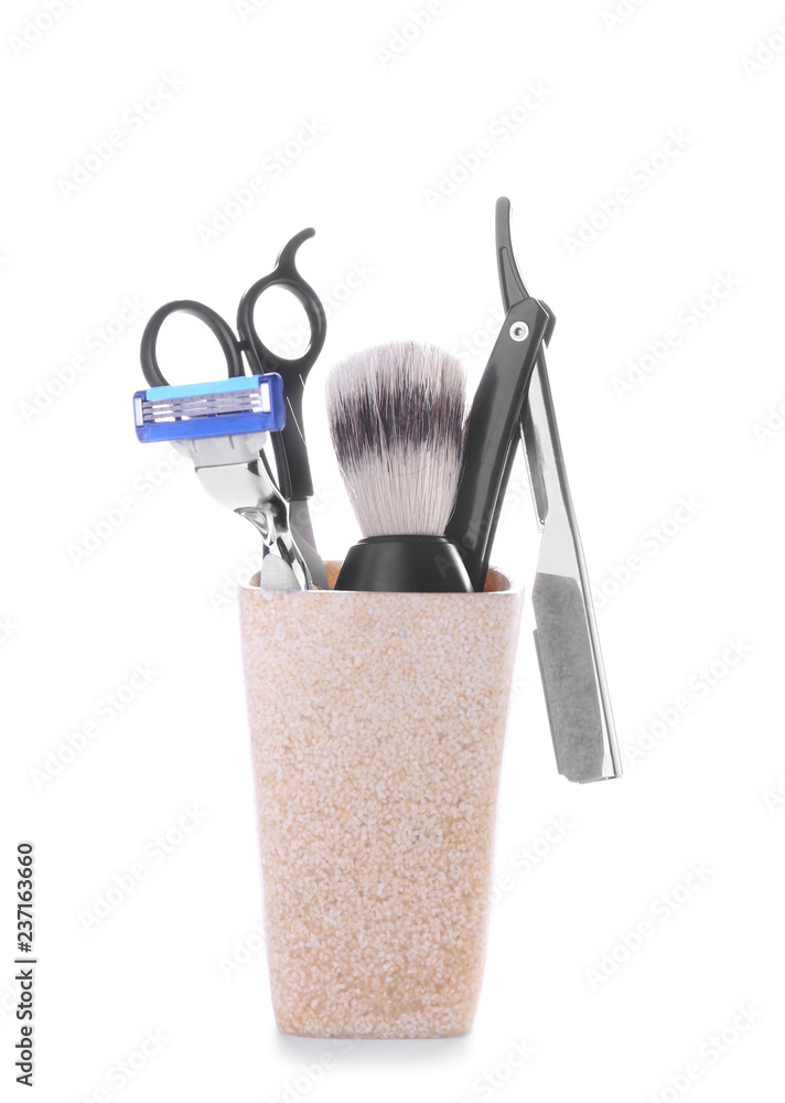 Shaving accessories on white background