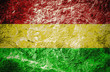 red, yellow, green, reggae's color  style on stone background