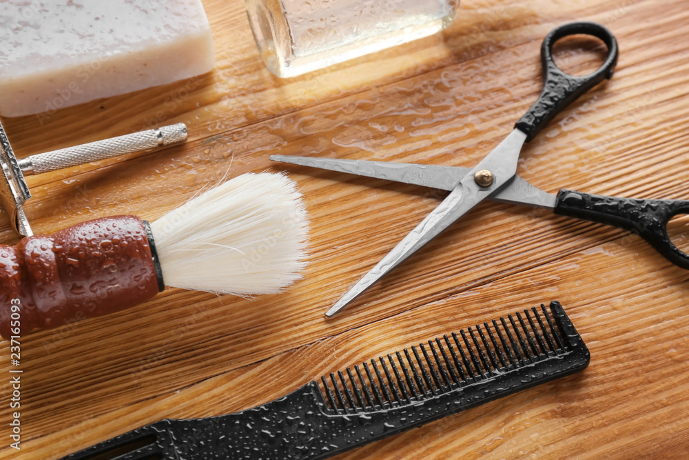 Shaving accessories for men on wooden table