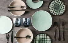 Set Of Clean Tableware On Grey Background