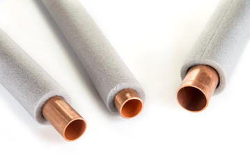 Insulation for heating pipes on a white background