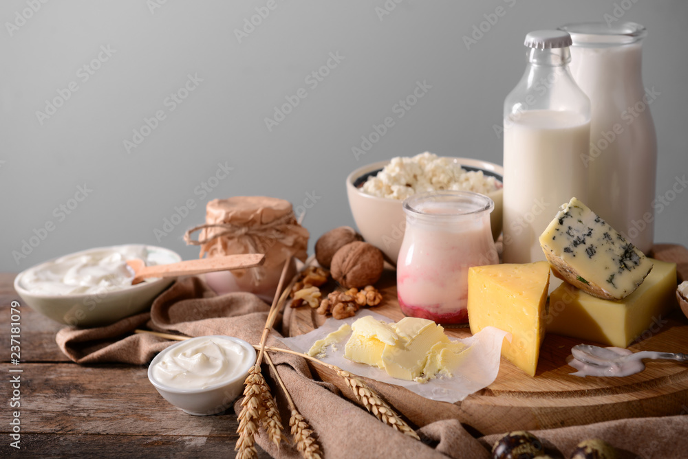 Different milk products on wooden table
