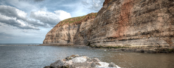 Steep coastal cliff face at Staithes, Eastt Yorkshire, UK