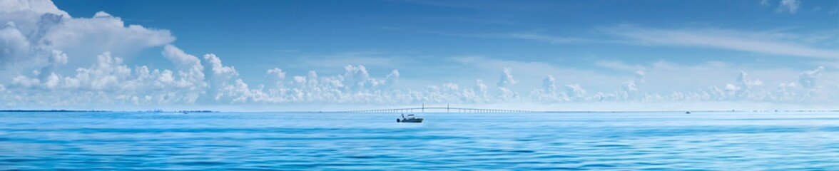 Fishing boat in front of Sunshine Skyway