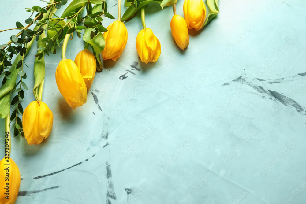 Beautiful tulips for Mother's Day on light background