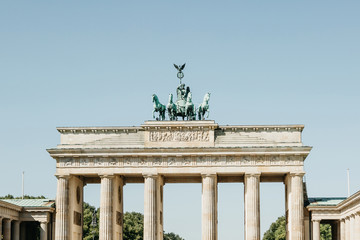 Wall Mural - Closeup of the Brandenburg Gate against the blue sky. This is one of the attractions of Berlin in Germany.