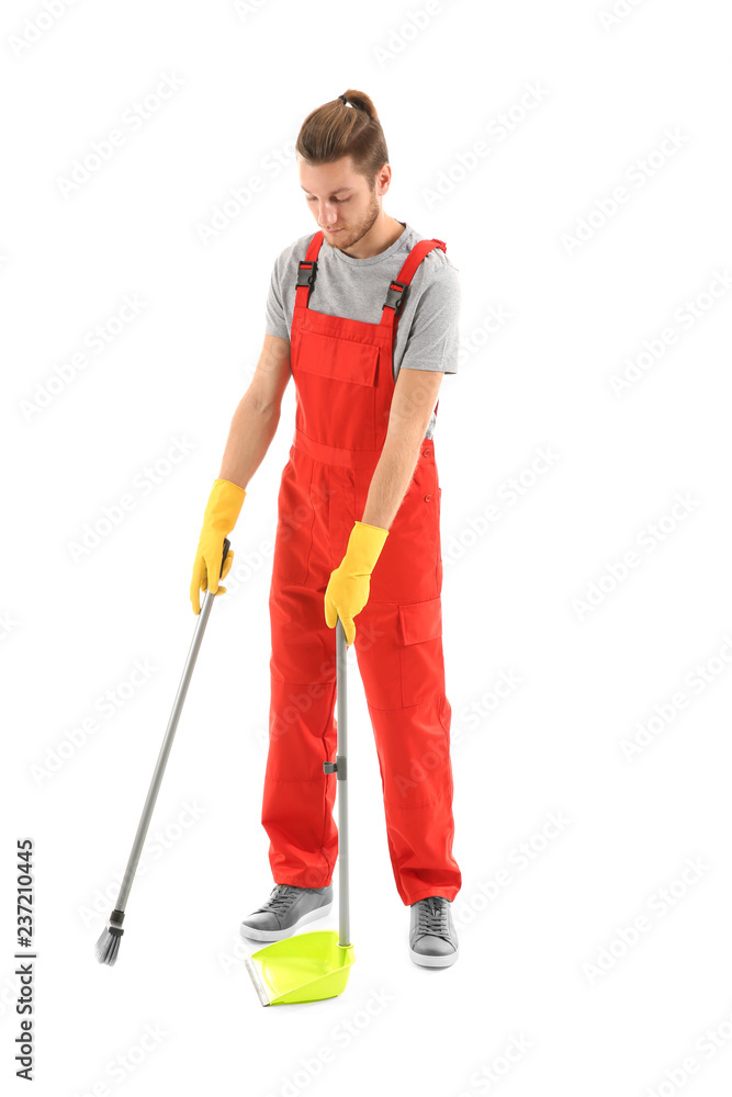 Man with dust pan and floor brush on white background