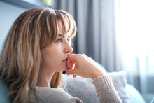 Woman At Home Deep In Thoughts Thinking And Planning