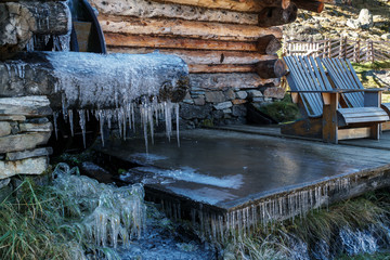 frozen water fountain in the alps