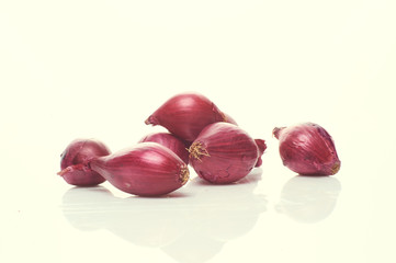 red onions isolated on light background