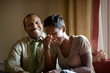 © Erickson Stock - Laughing mid-adult couple.