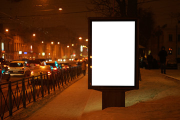 Wall Mural - city outdoor billboard mockup Glows in the darkness of the night city winter.