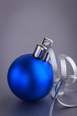 Christmas composition of Christmas tree toys on a blurred silver background