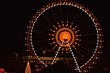 Ferry wheel in Christmas market full with lights colorful