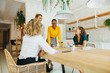 © BONNINSTUDIO/Stocksy - Female team working in a modern office.