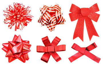 collection of red ribbon bows isolated on white background.