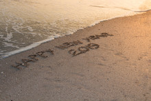 Happy New Year 2019,written In Sand Write On Tropical Beach With Wave