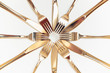 © Vera Lair/Stocksy - Golden cutlery