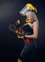 Wall Mural - girl in a construction firm works with a tape measure