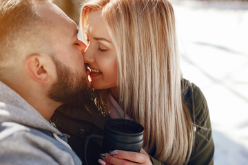 Wall Mural - Elegant couple in a winter park