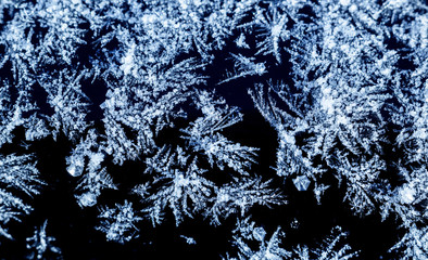 Macro image of ice crystals, winter background close-up.