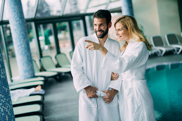 Wall Mural - Portrait of attractive couple in spa center