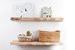© amixstudio - Wooden shelves with decor items. Home interior