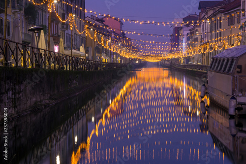 Fotomural Night view of Naviglio Grande canal waterway in Milan, Italy
