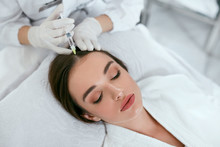 Mesotherapy For Hair Growth. Woman Receiving Injection In Head