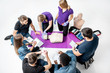 © rh2010 - Group of young people sitting in a circle during the first aid courses with two instructors showing some practise on medical dummies in the white room.
