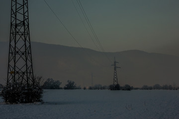 electric poles in winter